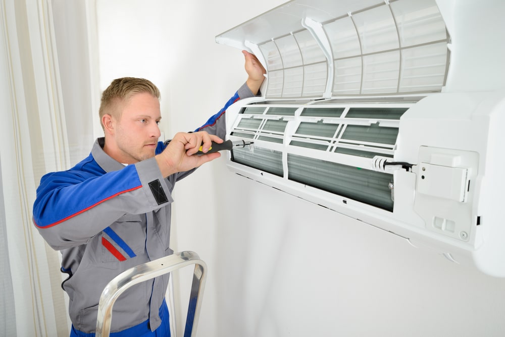 HVAC Contractor Performing Ductless AC Installation