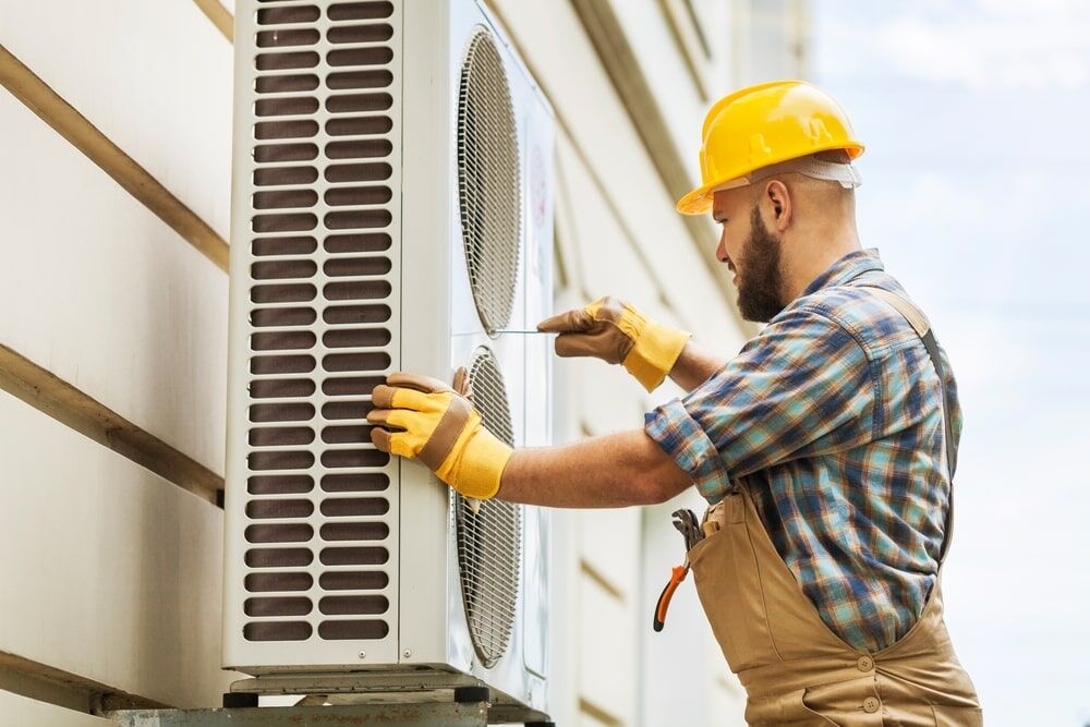 HVAC Contractor Conducting Emergency AC Repair