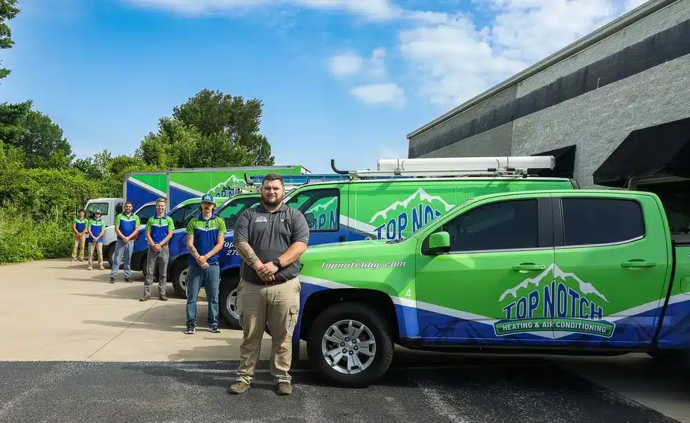 Top-Notch Team in front of fleet trucks in Bowling Green